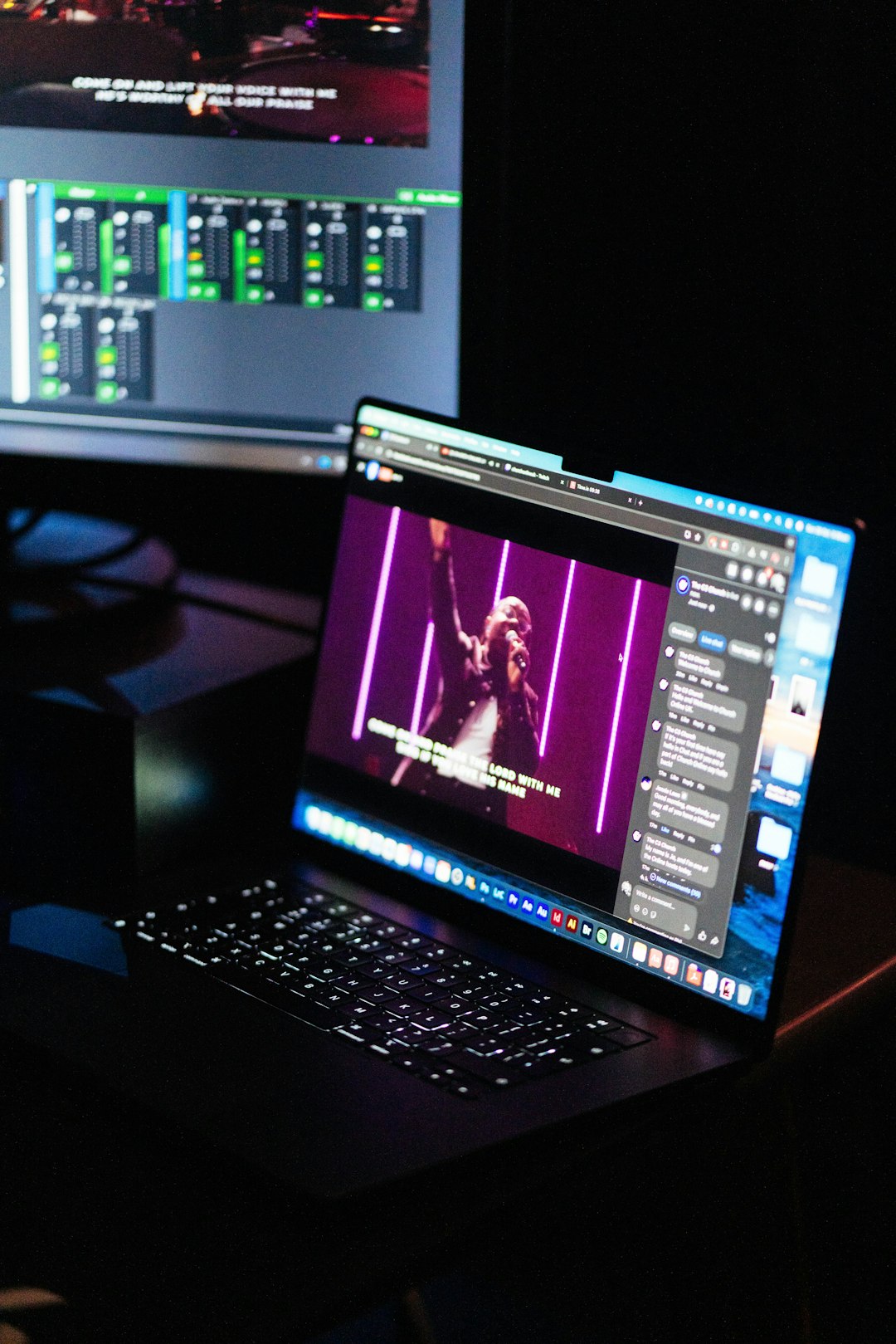 mission-02 laptop-displaying-video-with-purple-background-lights-qkiz-xwjjlg
